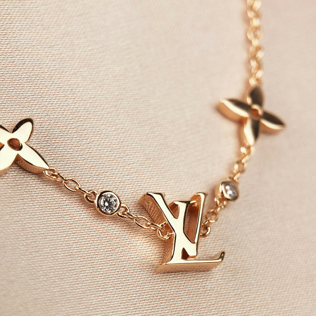 [Sophire Jewelry ]STAR AND SUN 7 MOTIFS GOLD BRACELET