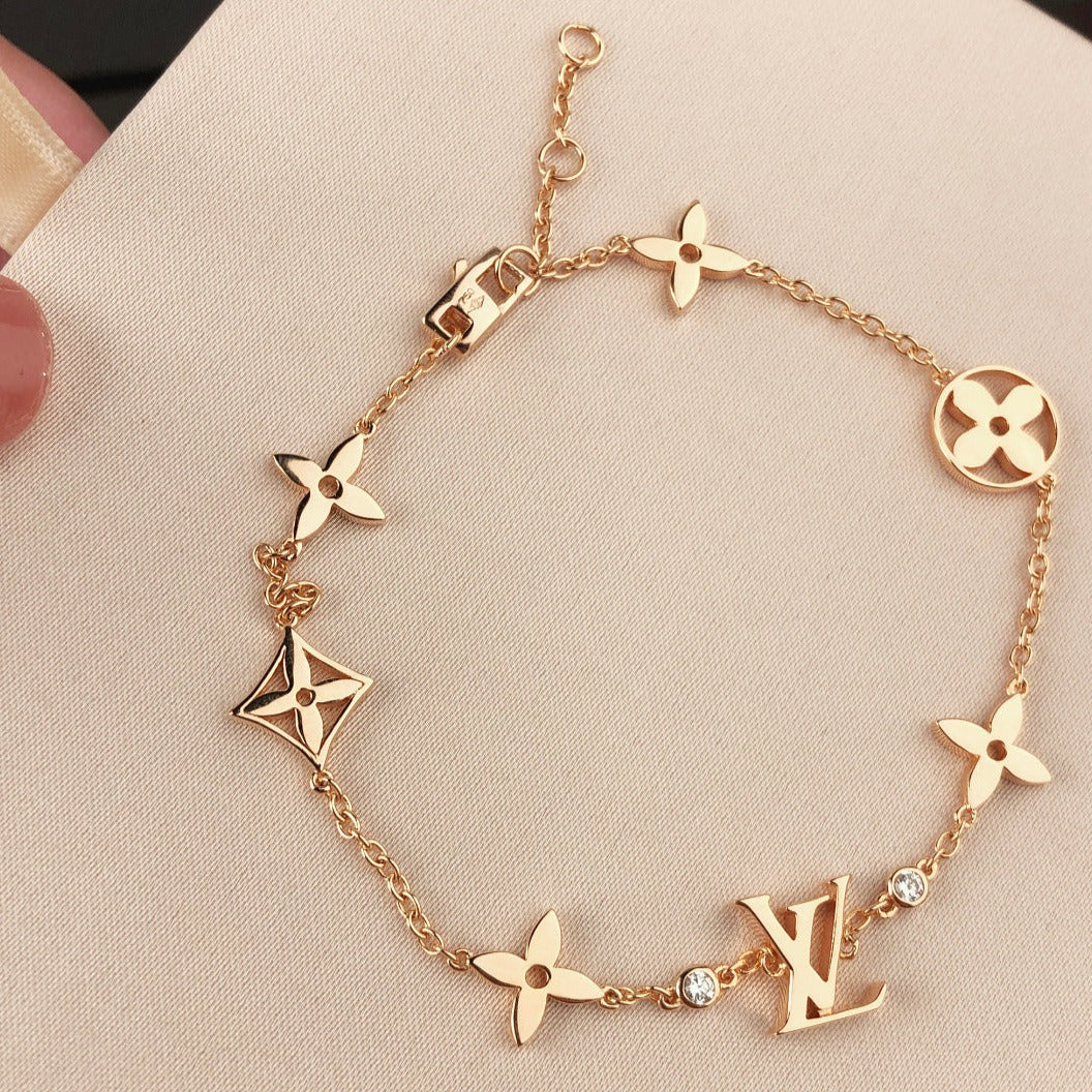 [Sophire Jewelry ]STAR AND SUN 7 MOTIFS GOLD BRACELET