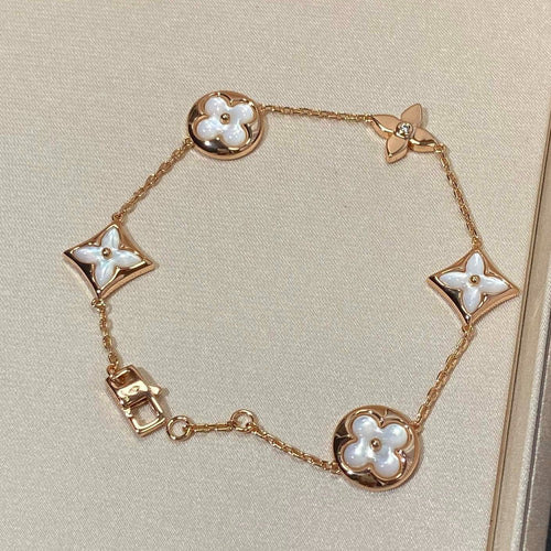 [Sophire Jewelry ]STAR AND SUN 5 MOTIF MOP PINK GOLD BRACELET