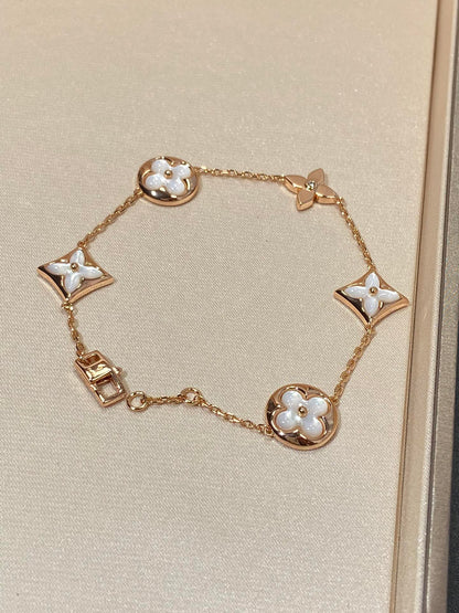 [Sophire Jewelry ]STAR AND SUN 5 MOTIF MOP PINK GOLD BRACELET