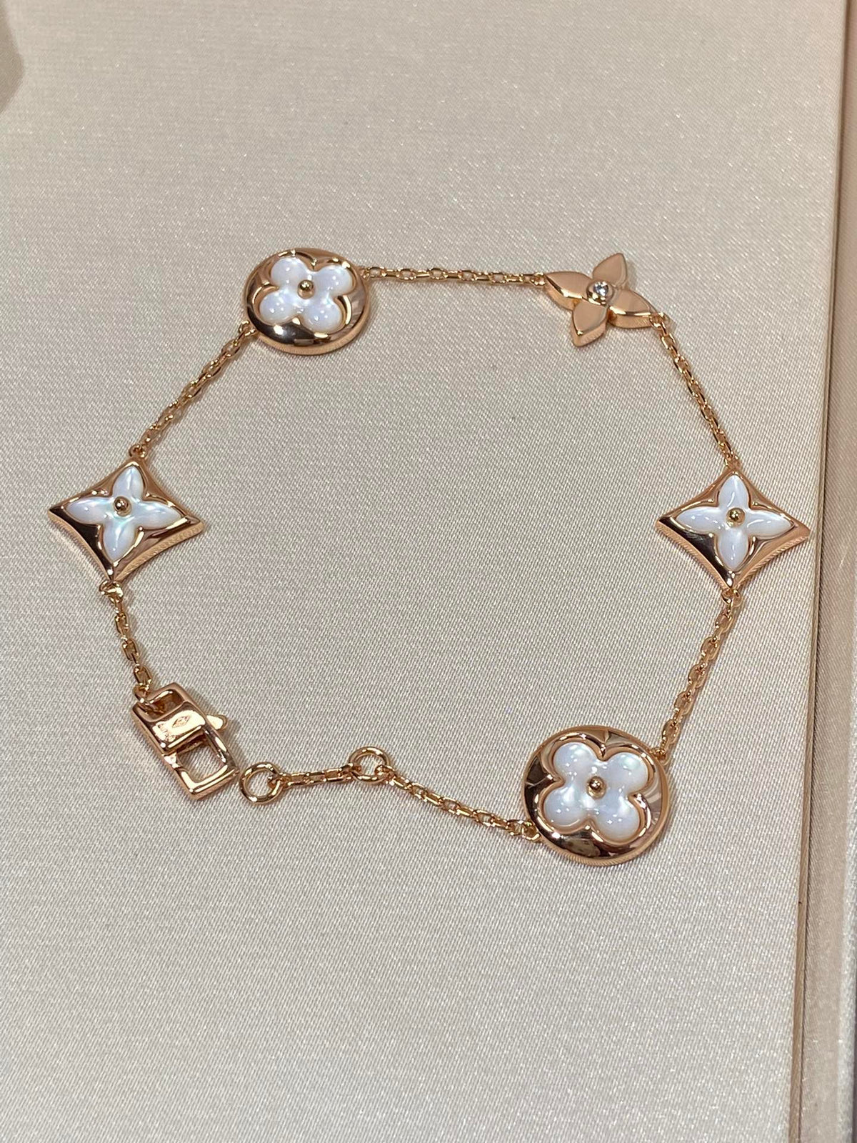 [Sophire Jewelry ]STAR AND SUN 5 MOTIF MOP PINK GOLD BRACELET