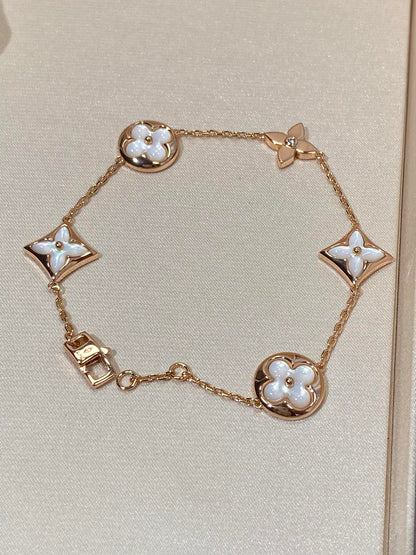 [Sophire Jewelry ]STAR AND SUN 5 MOTIF MOP PINK GOLD BRACELET