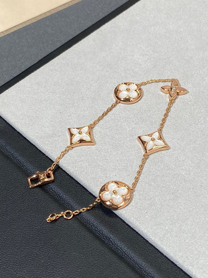 [Sophire Jewelry ]STAR AND SUN 5 MOTIF MOP PINK GOLD BRACELET