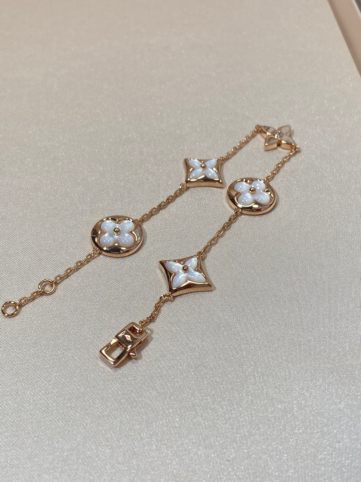 [Sophire Jewelry ]STAR AND SUN 5 MOTIF MOP PINK GOLD BRACELET