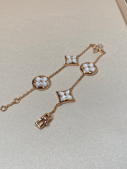 [Sophire Jewelry ]STAR AND SUN 5 MOTIF MOP PINK GOLD BRACELET