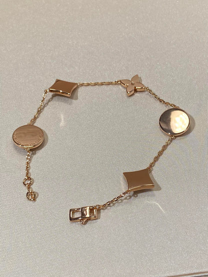 [Sophire Jewelry ]STAR AND SUN 5 MOTIF MOP PINK GOLD BRACELET