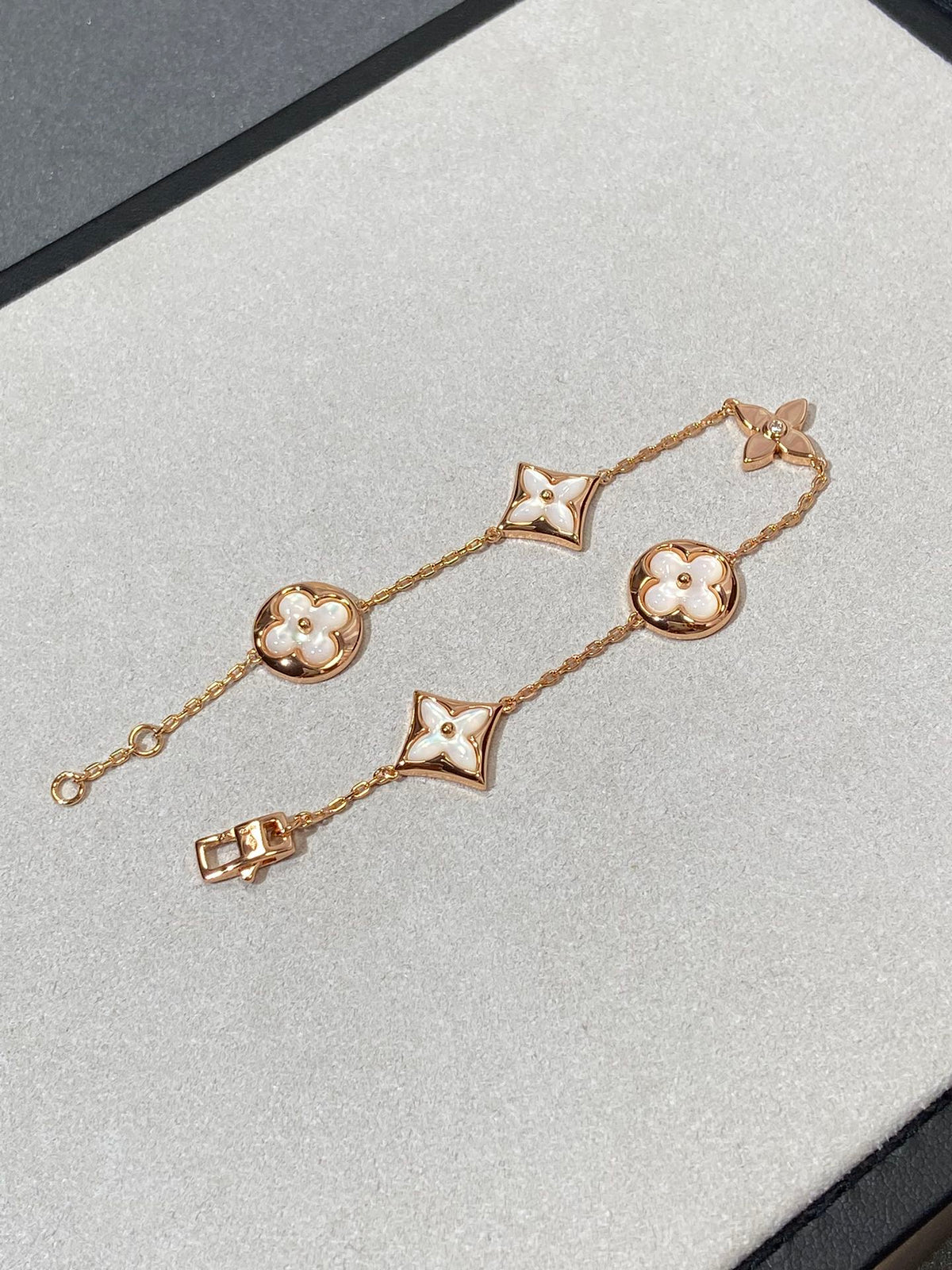 [Sophire Jewelry ]STAR AND SUN 5 MOTIF MOP PINK GOLD BRACELET