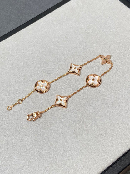 [Sophire Jewelry ]STAR AND SUN 5 MOTIF MOP PINK GOLD BRACELET