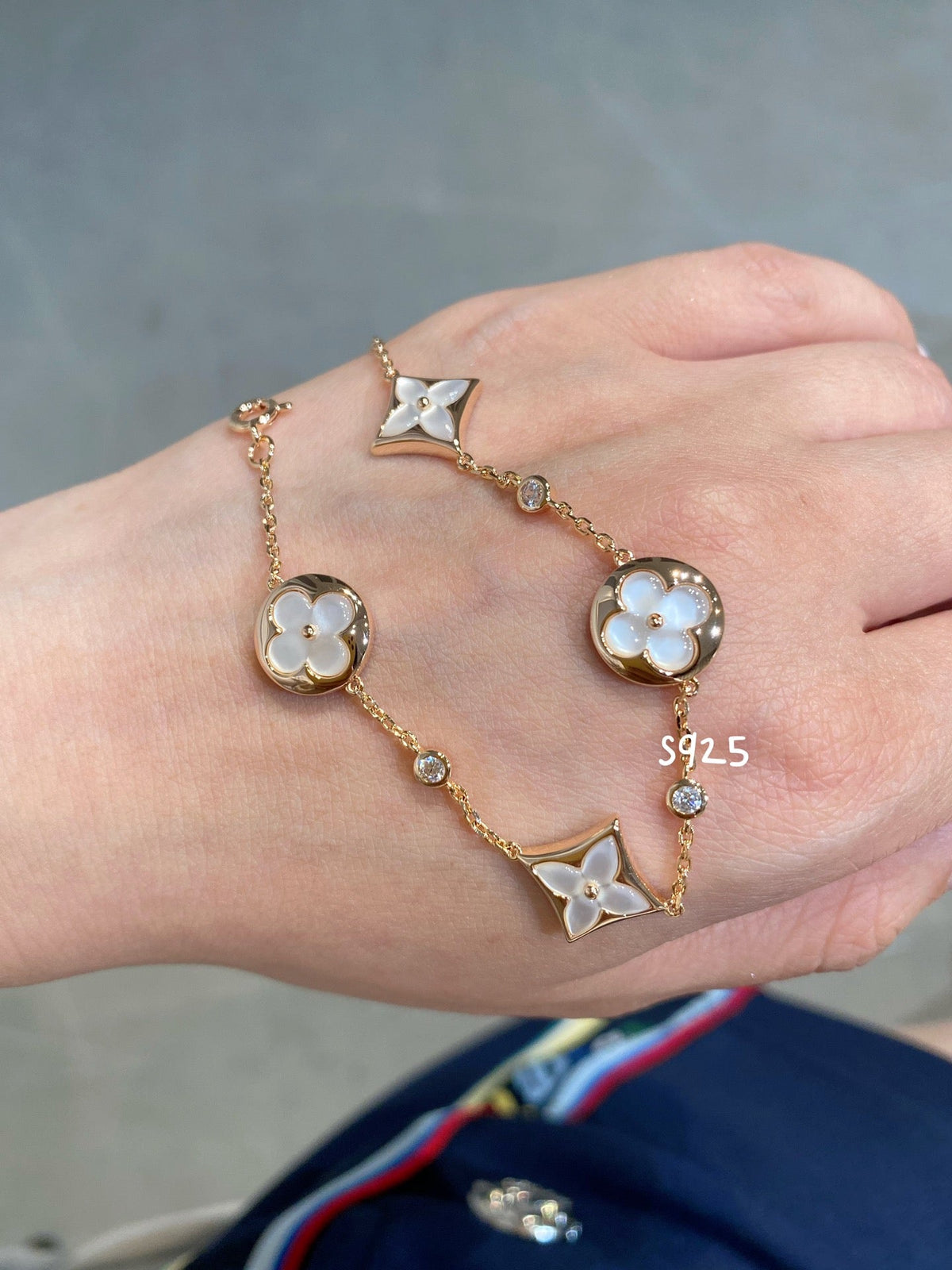[Sophire Jewelry ]STAR AND SUN 4 MOTIF WHITE MOP PINK GOLD BRACELET