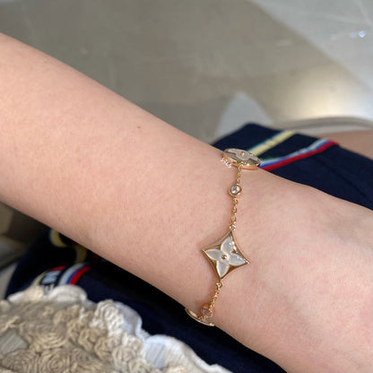 [Sophire Jewelry ]STAR AND SUN 4 MOTIF WHITE MOP PINK GOLD BRACELET