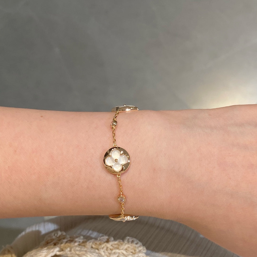 [Sophire Jewelry ]STAR AND SUN 4 MOTIF WHITE MOP PINK GOLD BRACELET