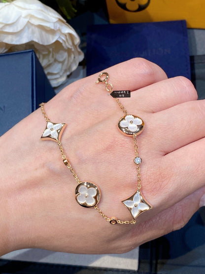 [Sophire Jewelry ]STAR AND SUN 4 MOTIF WHITE MOP PINK GOLD BRACELET