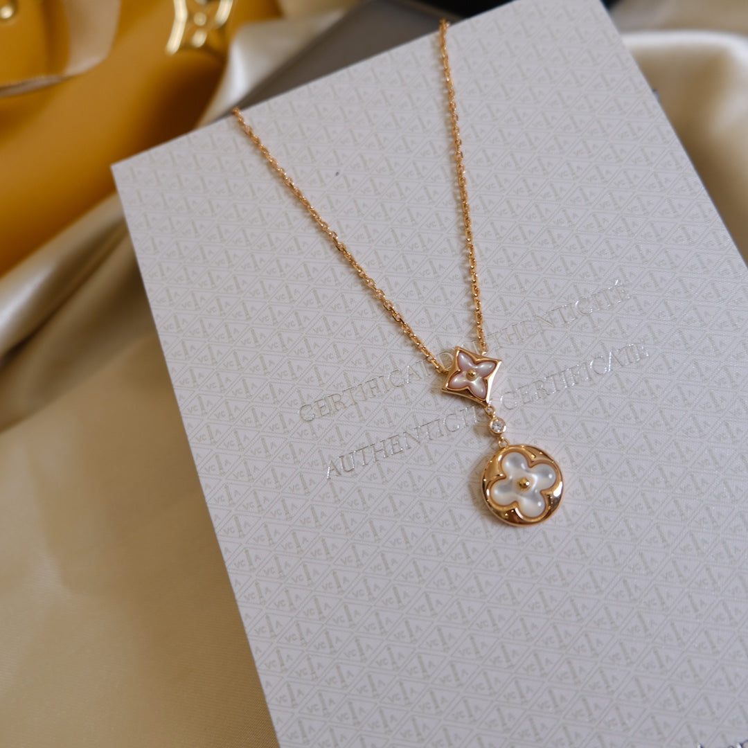 [Sophire Jewelry ]STAR AND SUN WHITE MOP 2 MOTIF PINK GOLD NECKLACE