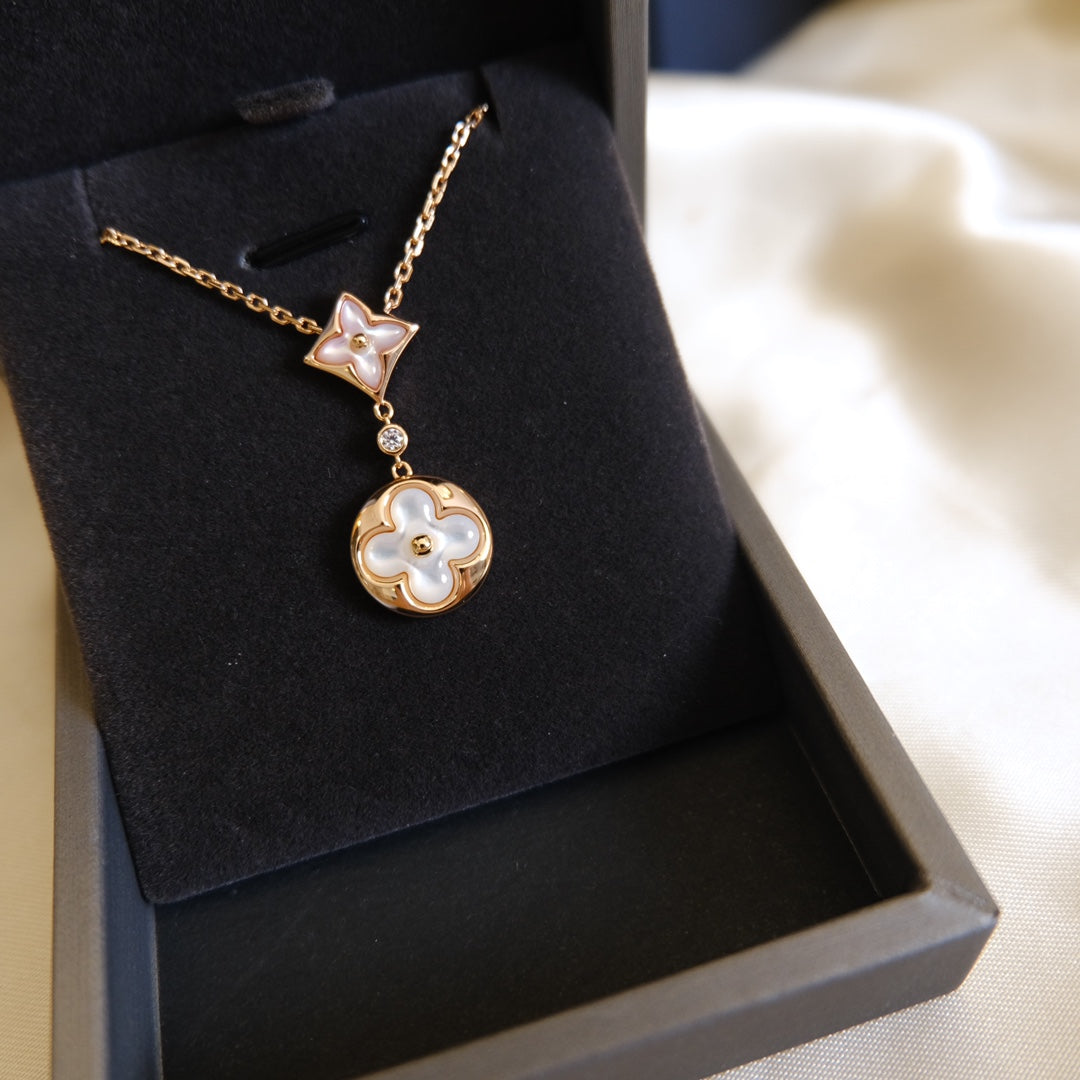 [Sophire Jewelry ]STAR AND SUN WHITE MOP 2 MOTIF PINK GOLD NECKLACE