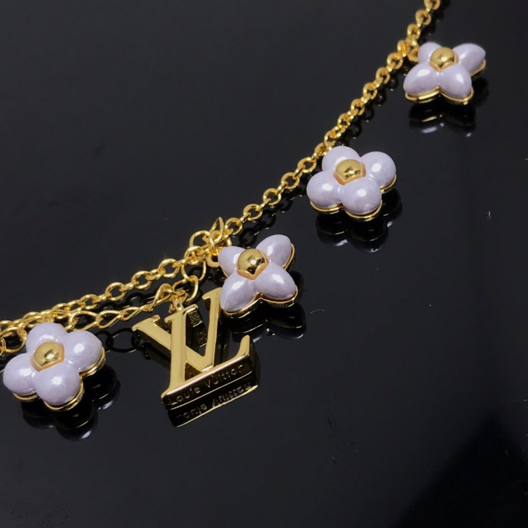 [Sophire Jewelry ]LOGO 6 MOTIF STAR AND SUN GOLD BRACELET