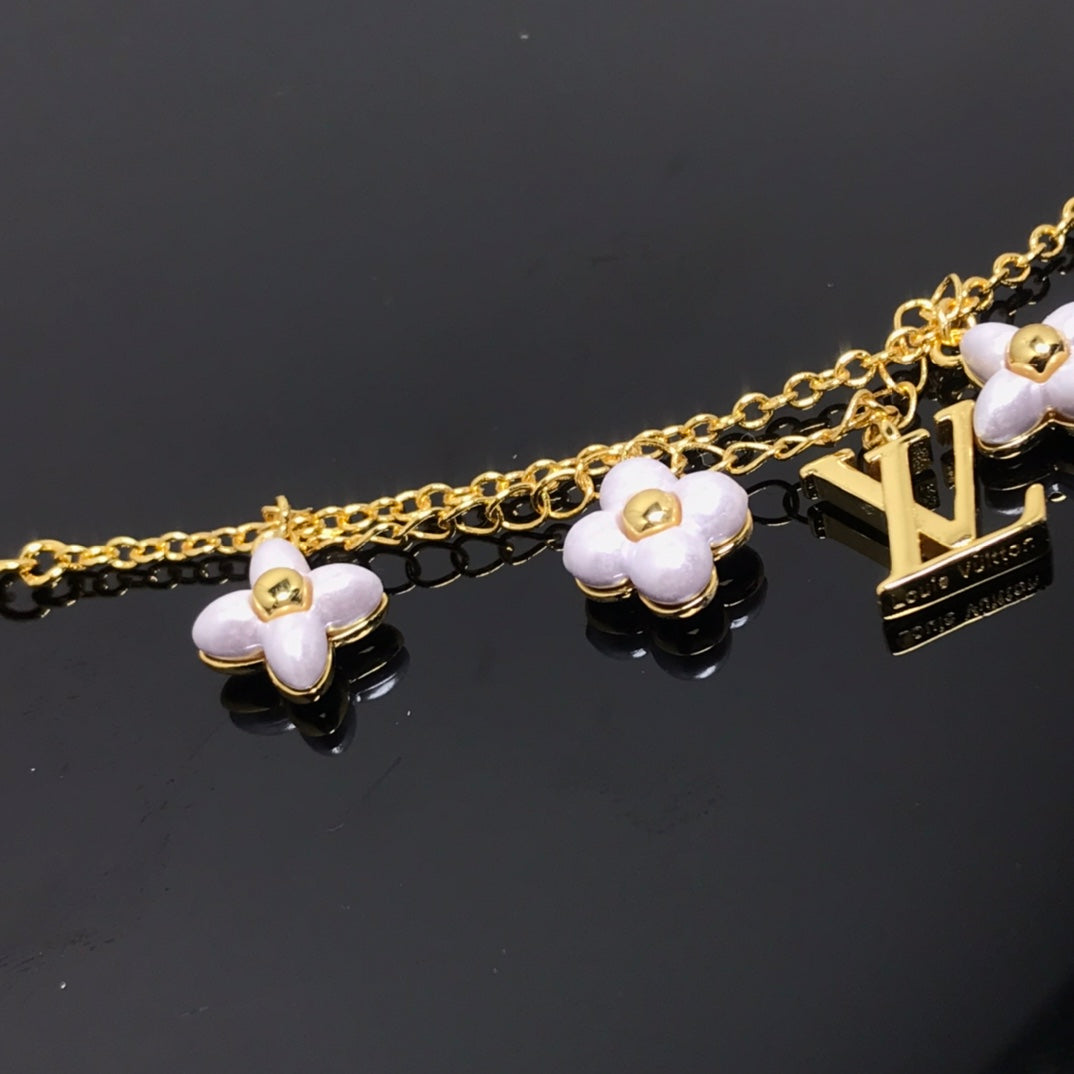 [Sophire Jewelry ]LOGO 6 MOTIF STAR AND SUN GOLD BRACELET