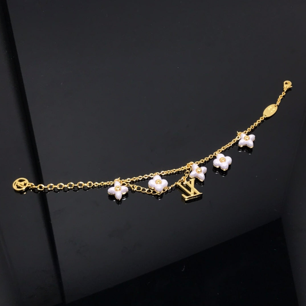 [Sophire Jewelry ]LOGO 6 MOTIF STAR AND SUN GOLD BRACELET