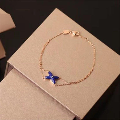 [Sophire Jewelry ]Hollow Design Four-Leaf Clover Flower Shape Bracelet
