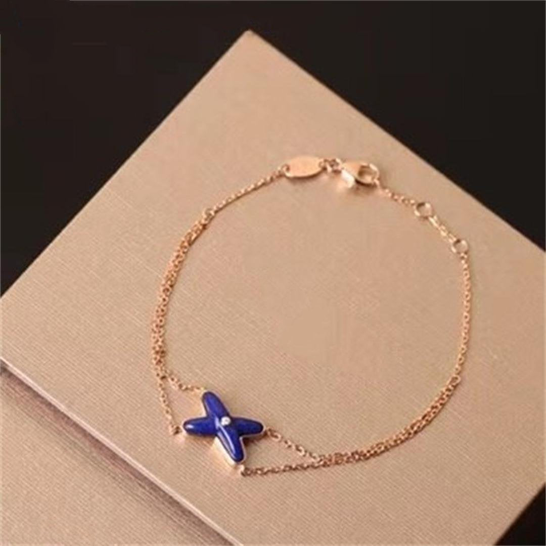 [Sophire Jewelry ]Hollow Design Four-Leaf Clover Flower Shape Bracelet