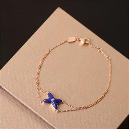[Sophire Jewelry ]Hollow Design Four-Leaf Clover Flower Shape Bracelet